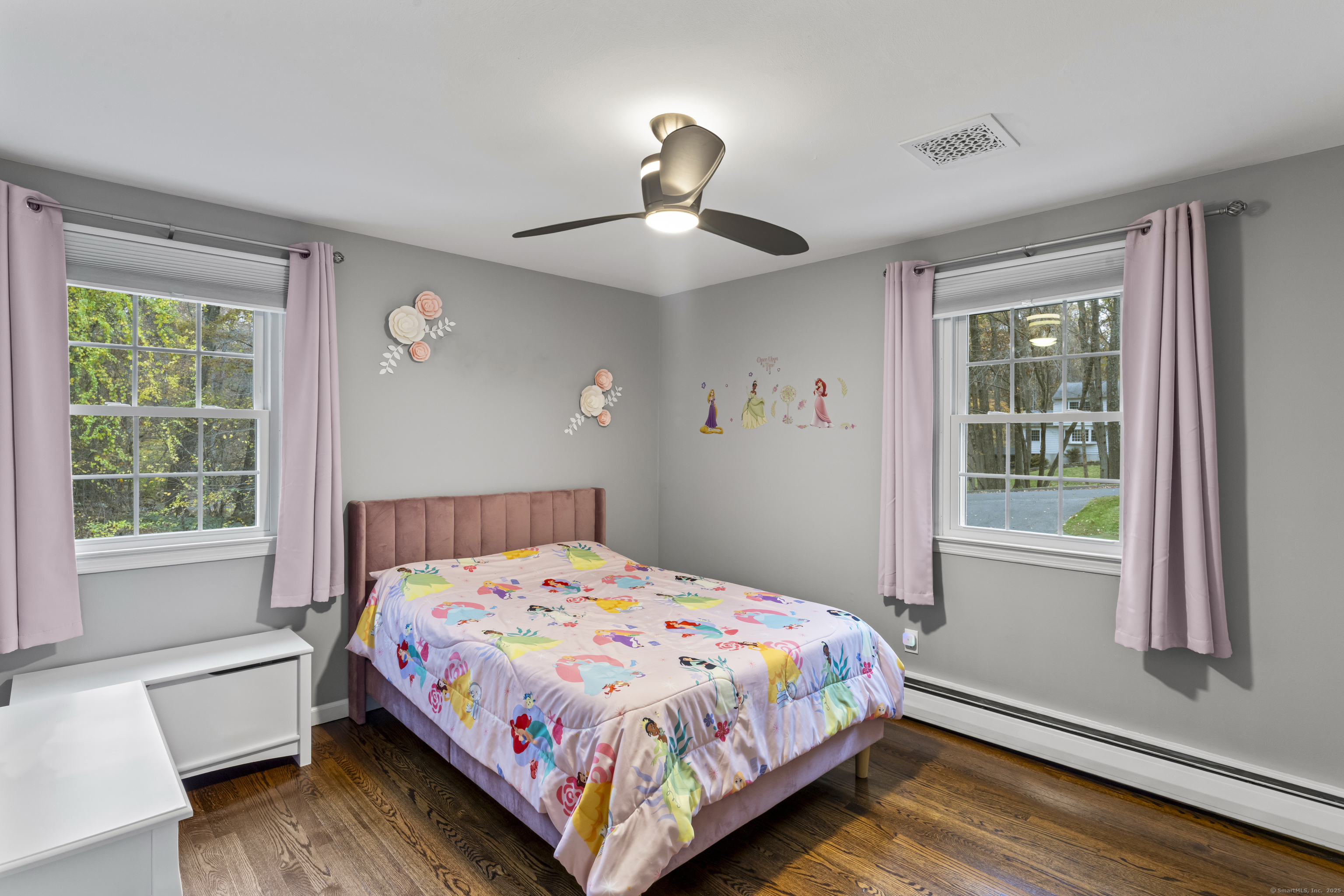 8 Possum Ridge Road Newtown, CT 06470 - Photo 26 of 38 a bedroom with a bed and a window with outer view