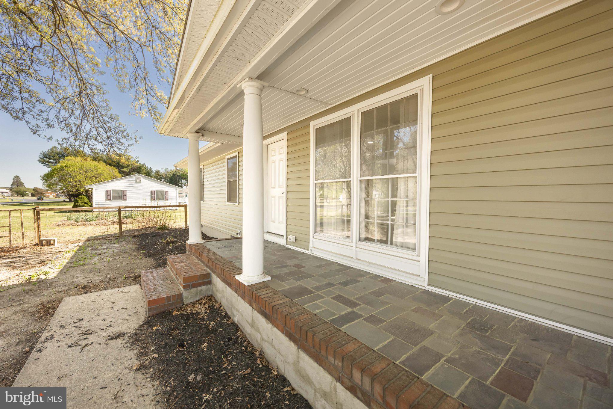 30797 Dagsboro Road Salisbury, MD 21804 - Photo 8 of 58 Charming porch with inviting entryway.