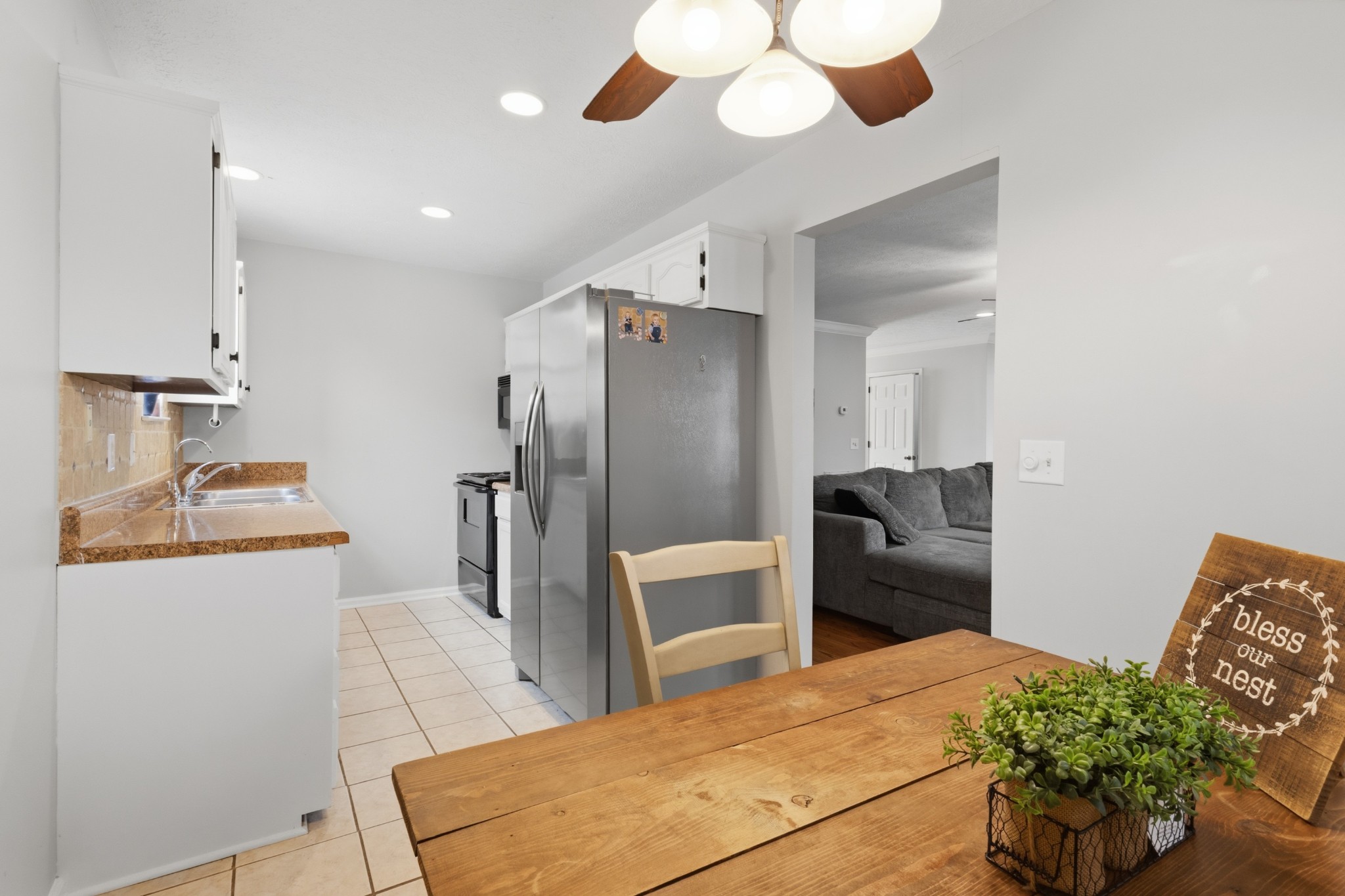 120 River Bend Road Hendersonville, TN 37075 - Photo 16 of 26 a kitchen with stainless steel appliances a refrigerator and a stove