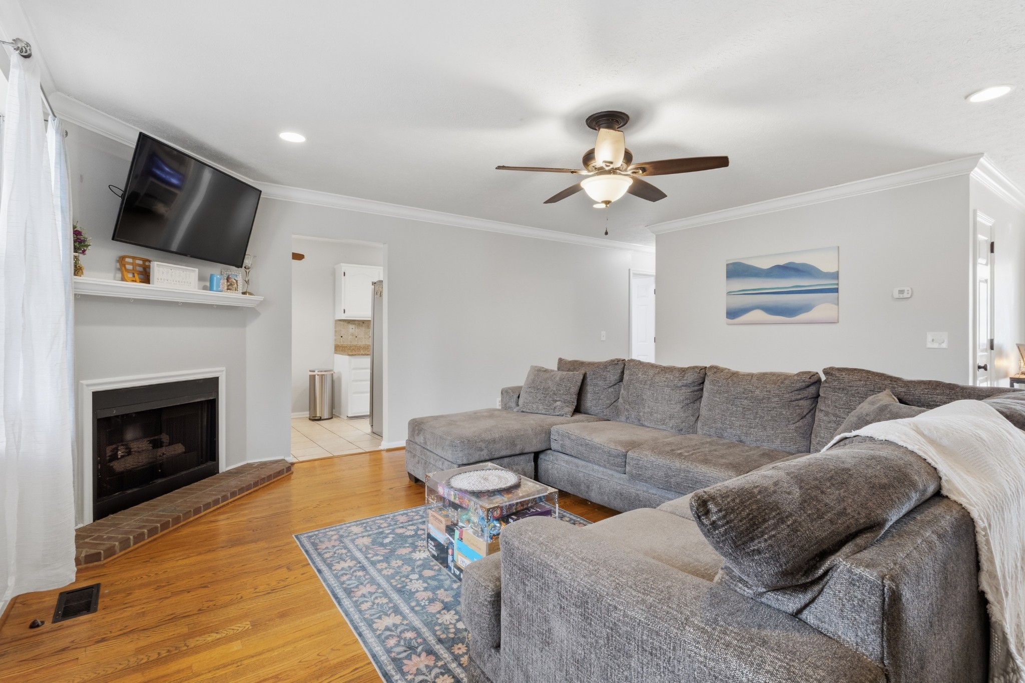 120 River Bend Road Hendersonville, TN 37075 - Photo 6 of 26 a living room with furniture fireplace and flat screen tv