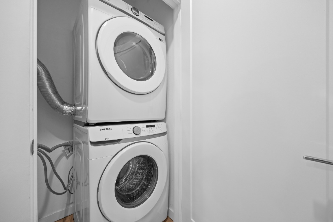 4801 Springdale Road, Unit 1401 Austin, TX 78723 - Photo 24 of 40 a utility room with dryer and washer