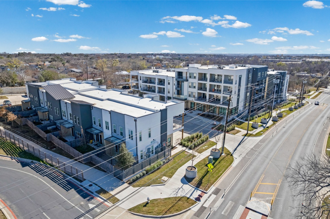 4801 Springdale Road, Unit 1401 Austin, TX 78723 - Photo 38 of 40 a view of a balcony with wooden floor and city view