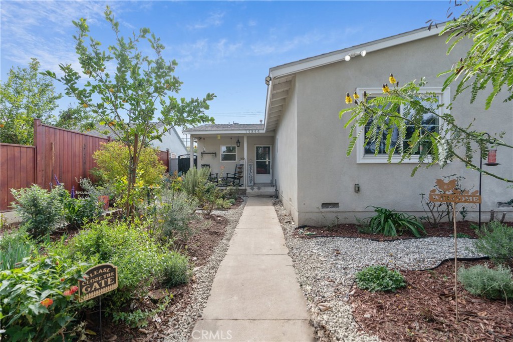 14844 Lull Street Van Nuys, CA 91405 - Photo 2 of 31 a front view of a house with garden
