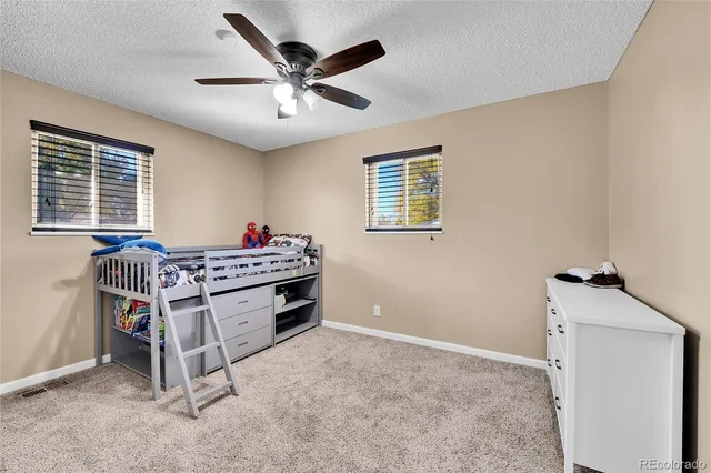 a room with furniture and window