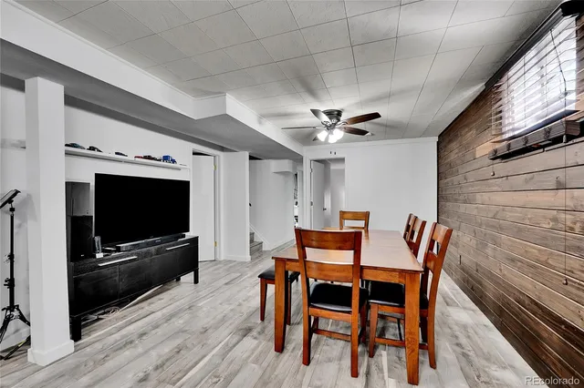 a view of a livingroom with furniture and a flat screen tv