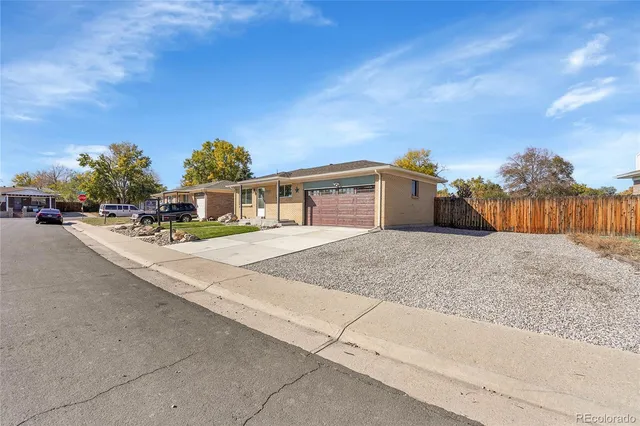 a view of house with outdoor space and street view