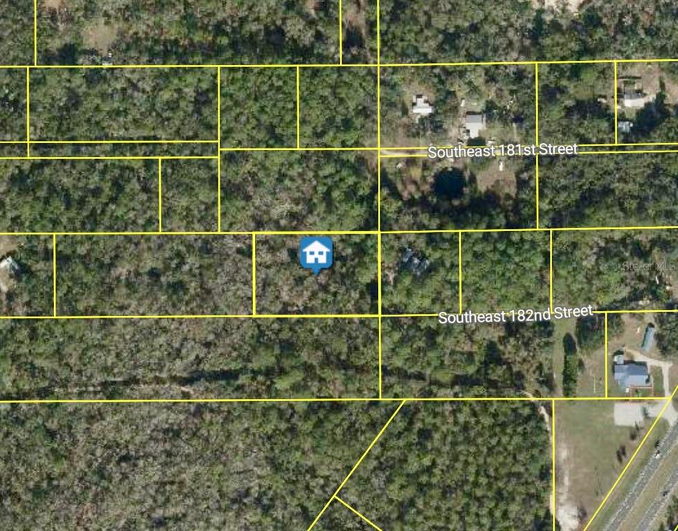 0 182nd Street Southeast Inglis, FL 34449 - Photo 5 of 11 a bathroom with a gate