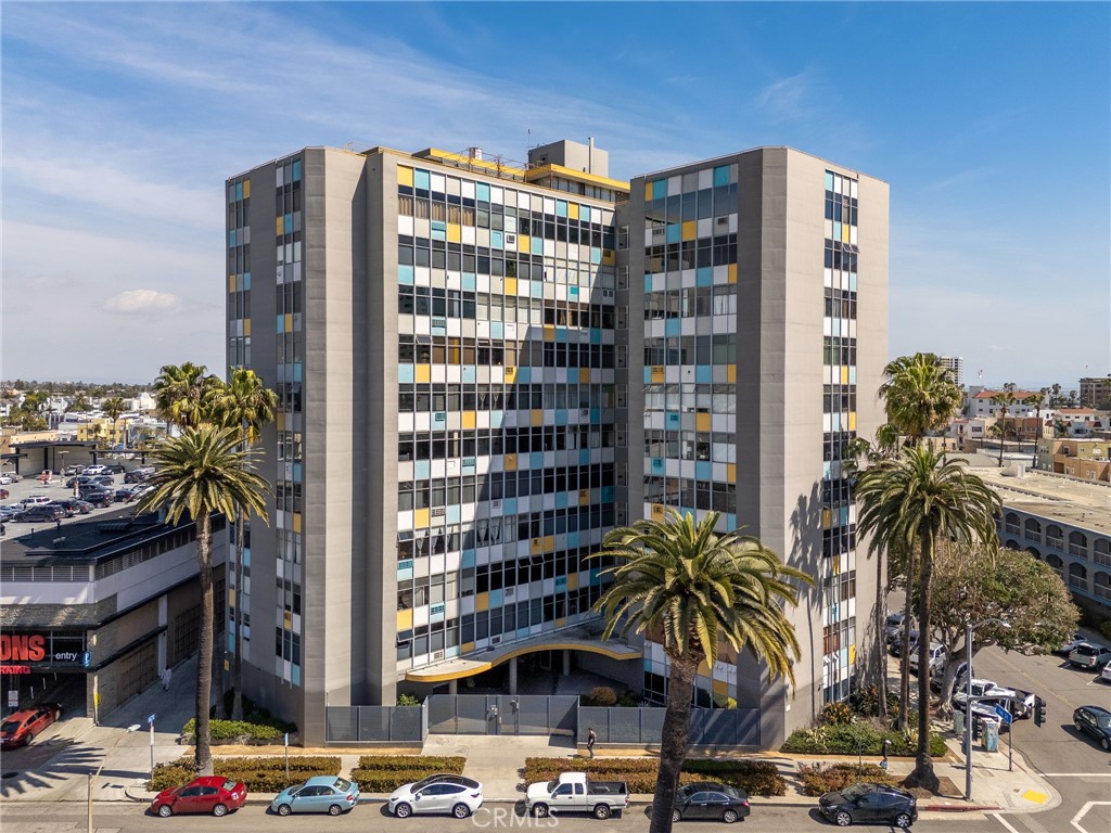100 Atlantic Avenue, Unit 604 Long Beach, CA 90802 - Photo 17 of 29 a front view of a building with palm trees