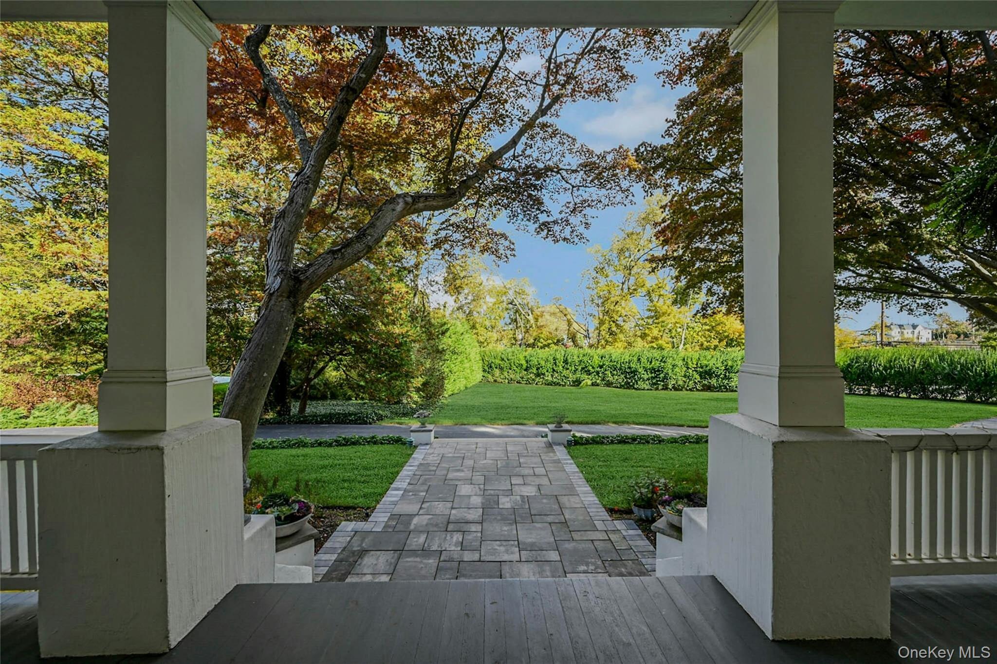 24 Harbor Hill Road Huntington Bay, NY 11743 - Photo 11 of 46 a view of a yard with plants