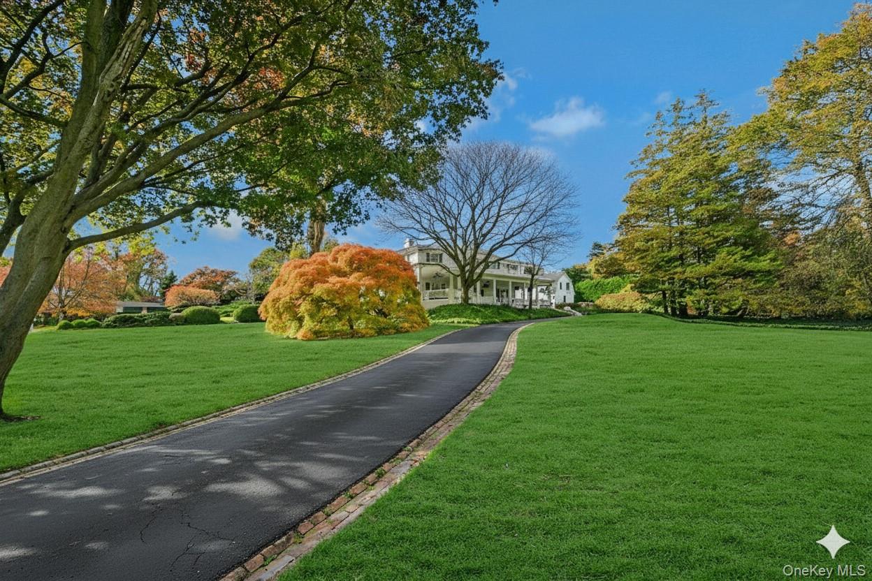 24 Harbor Hill Road Huntington Bay, NY 11743 - Photo 2 of 46 a view of a park with large trees