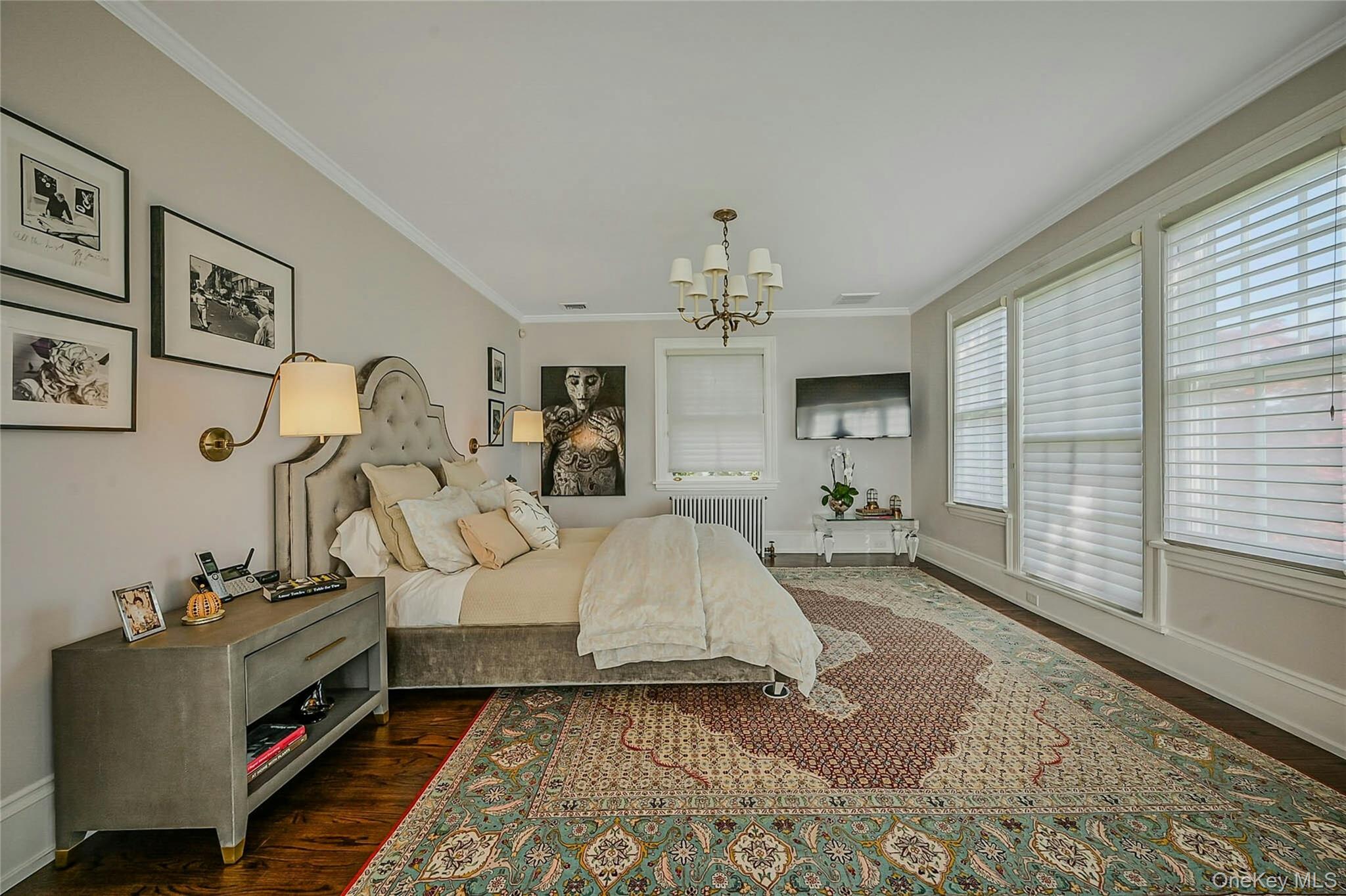 24 Harbor Hill Road Huntington Bay, NY 11743 - Photo 24 of 46 a living room with furniture and a chandelier