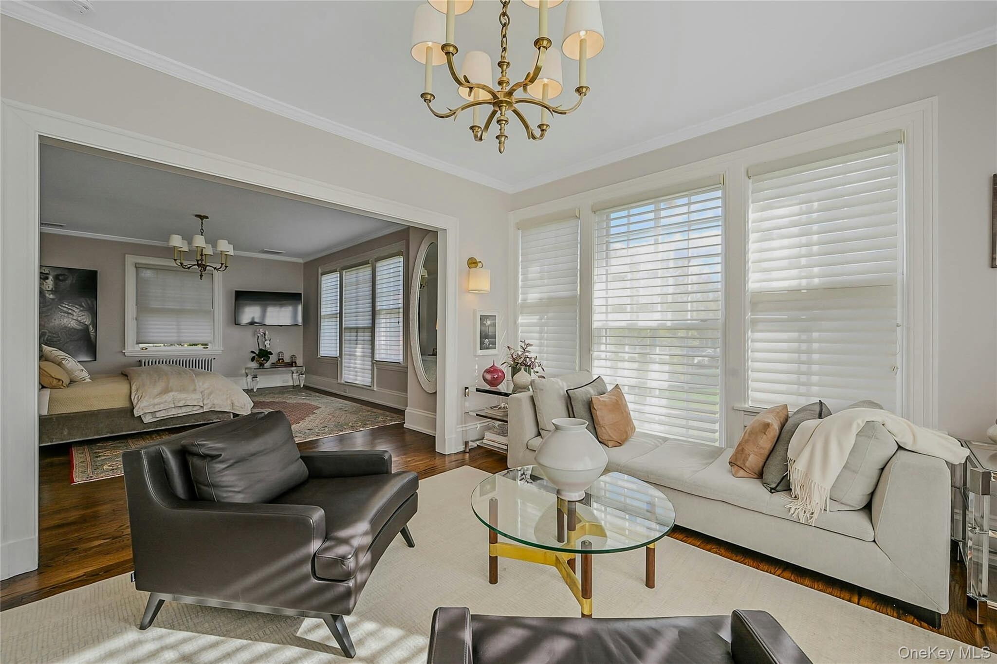 24 Harbor Hill Road Huntington Bay, NY 11743 - Photo 25 of 46 a living room with furniture and a large window