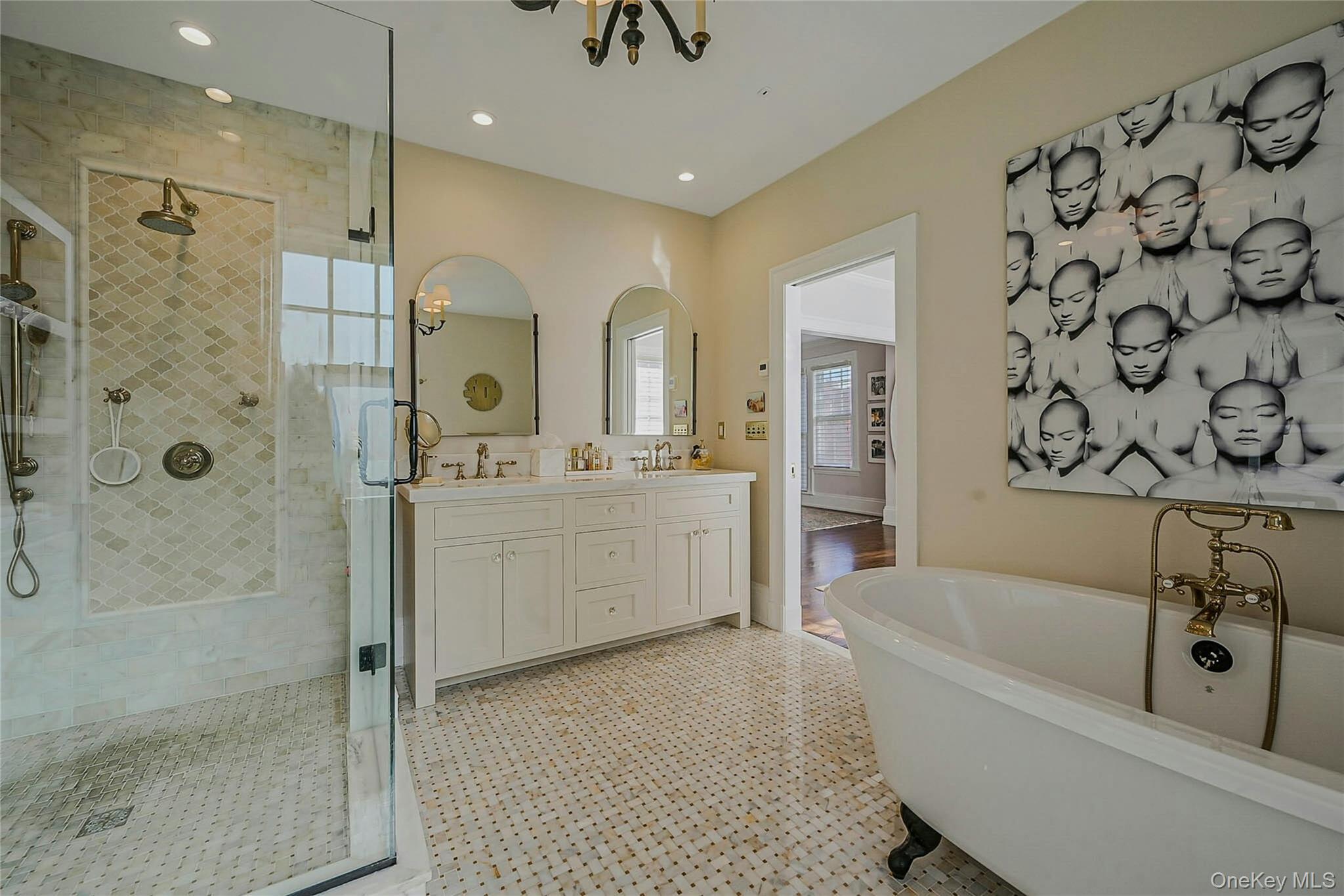 24 Harbor Hill Road Huntington Bay, NY 11743 - Photo 27 of 46 a bathroom with a bathtub a shower a sink and mirror