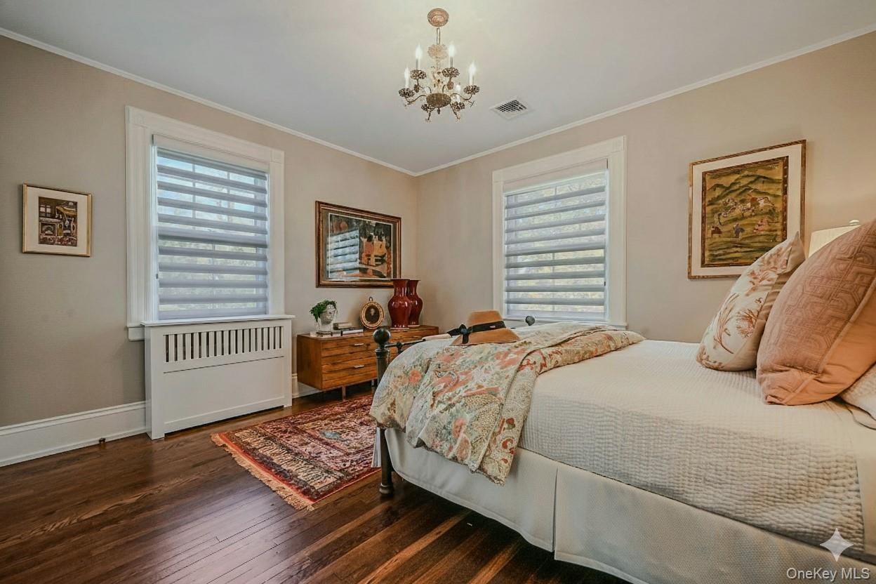 24 Harbor Hill Road Huntington Bay, NY 11743 - Photo 30 of 46 a bedroom with bed and window