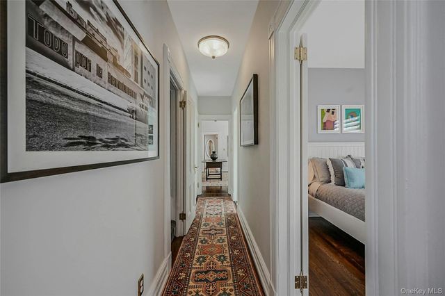 a hallway with a bookshelf