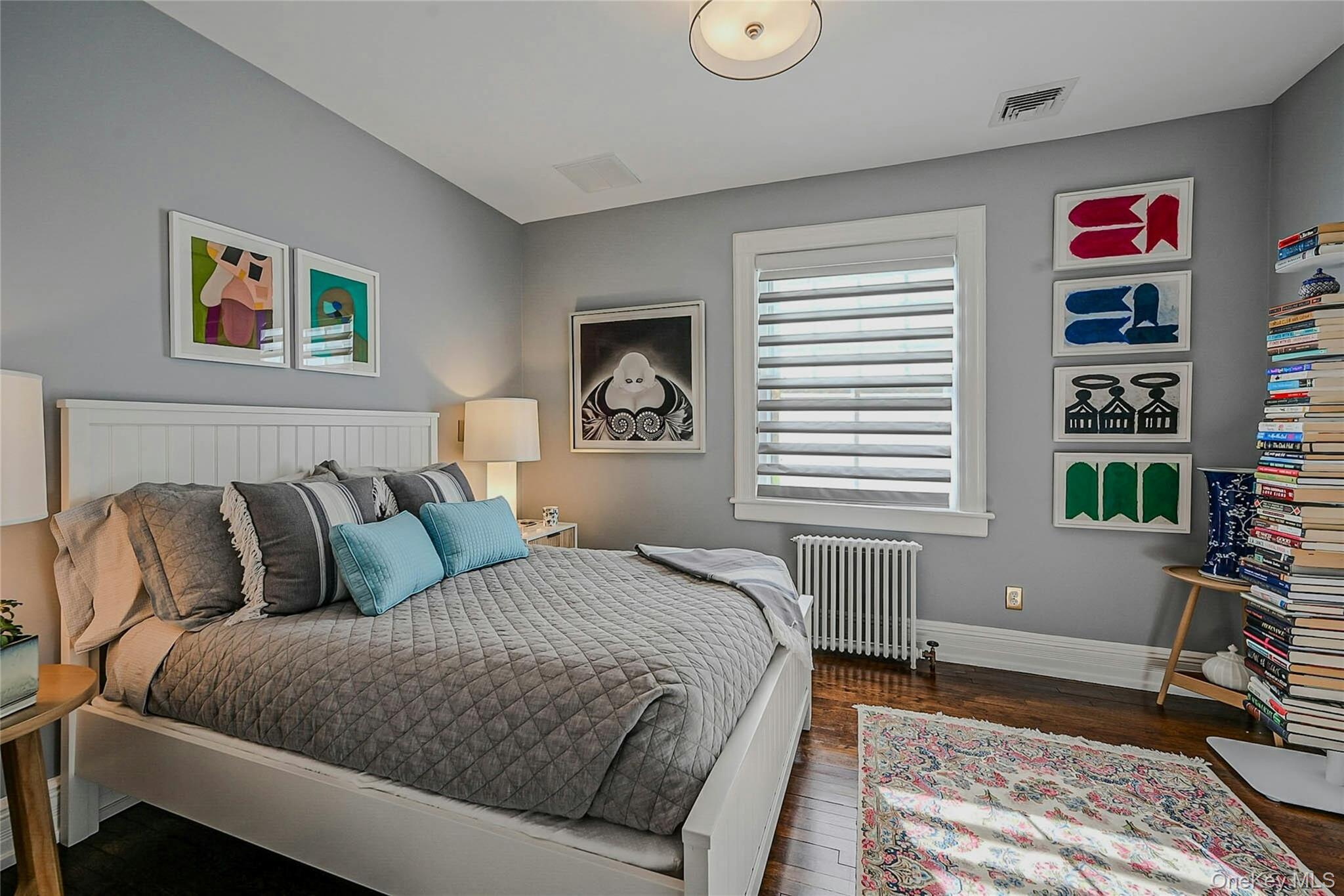 24 Harbor Hill Road Huntington Bay, NY 11743 - Photo 33 of 46 a bedroom with bed and a window