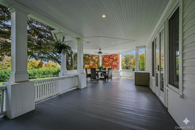 a view of a porch and garden