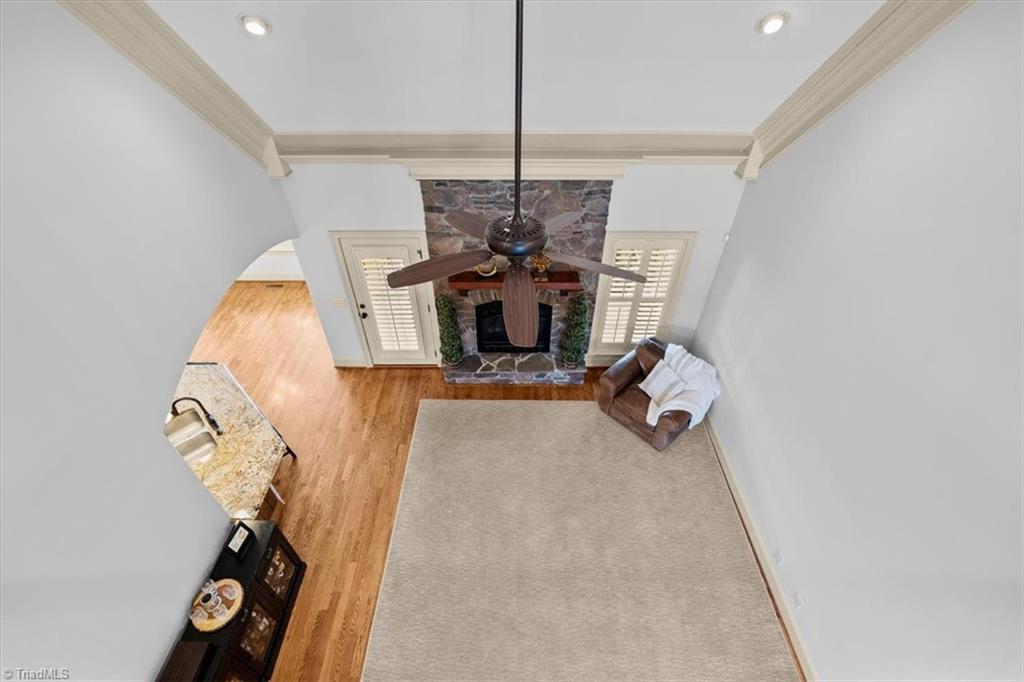 7787 Sutter Road Greensboro, NC 27455 - Photo 30 of 50 Expansive view from the second-floor balcony into the Great Room.