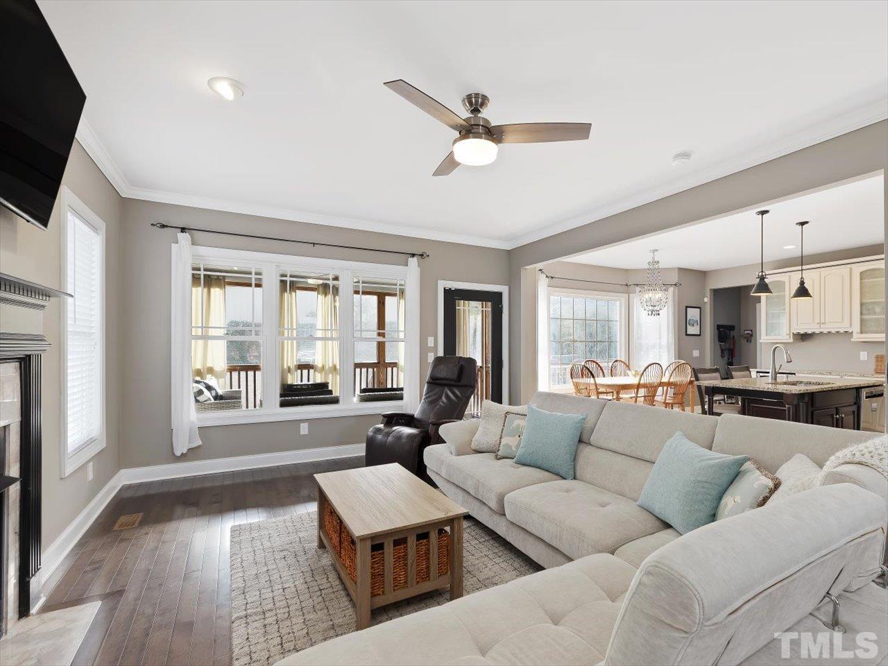 911 Wade Avenue Raleigh, NC 27605 - Photo 14 of 60 a living room with furniture and a large window