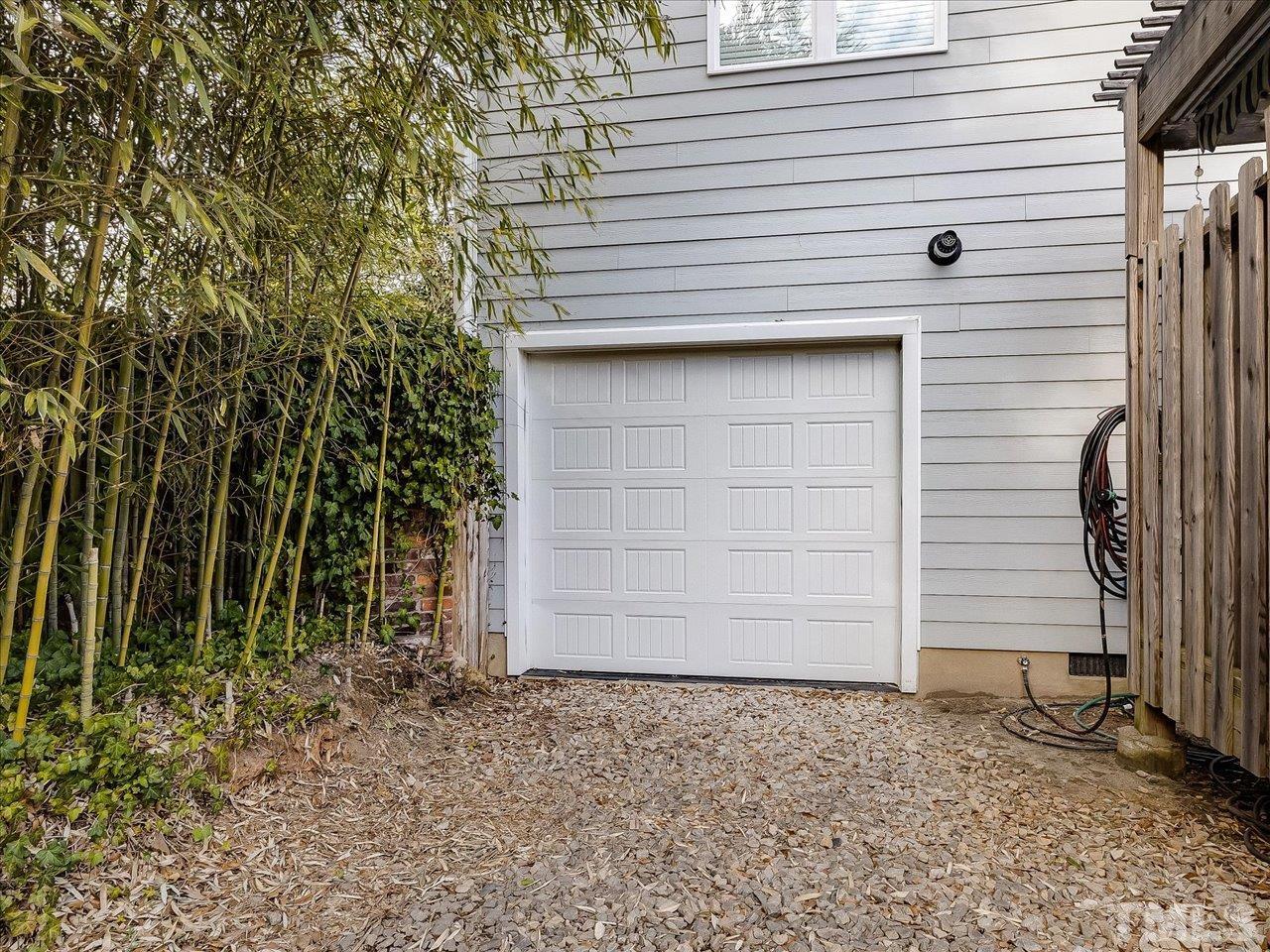 911 Wade Avenue Raleigh, NC 27605 - Photo 29 of 60 a front view of a house with a yard