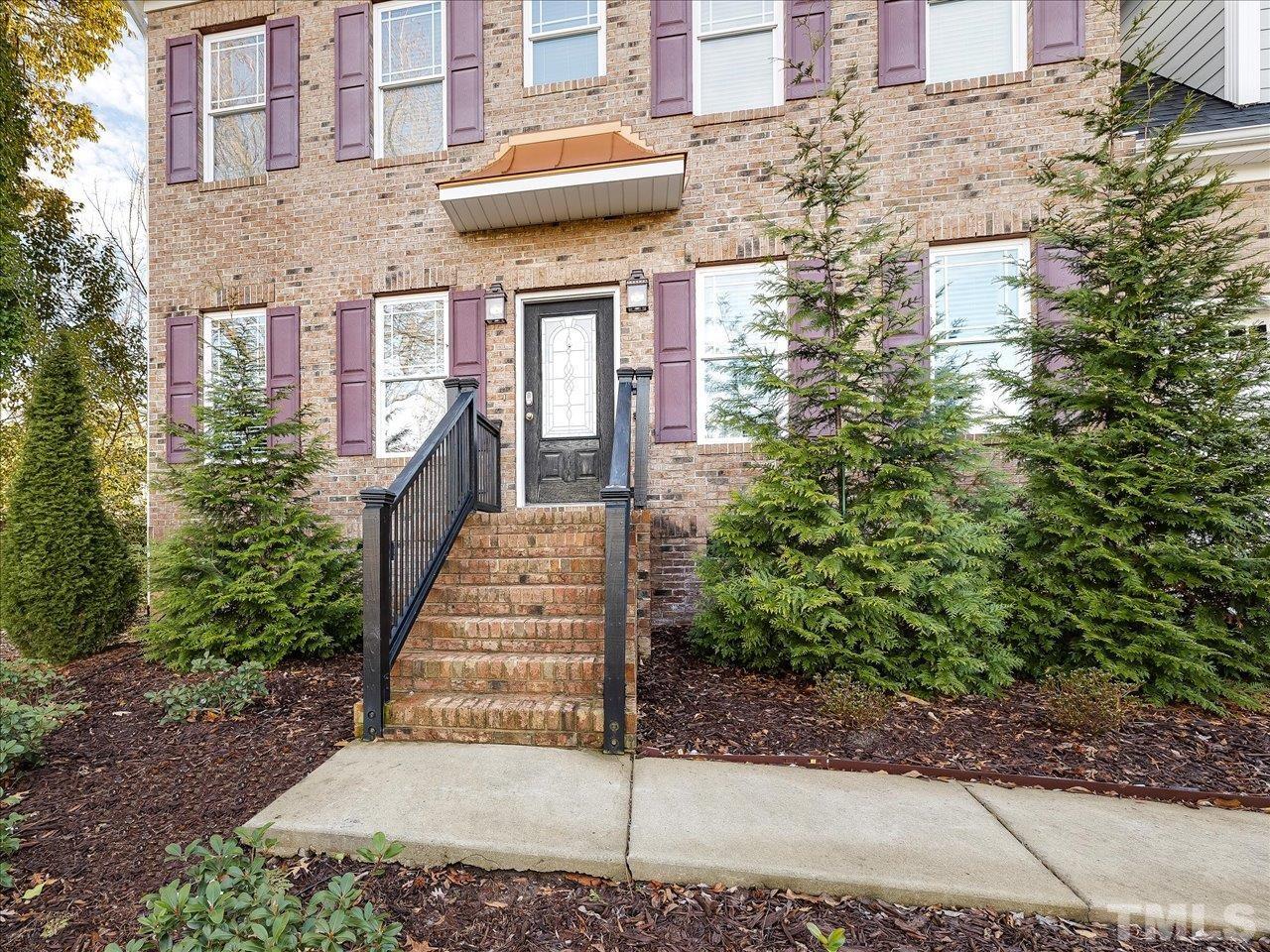 911 Wade Avenue Raleigh, NC 27605 - Photo 4 of 60 a view of a brick building next to a road