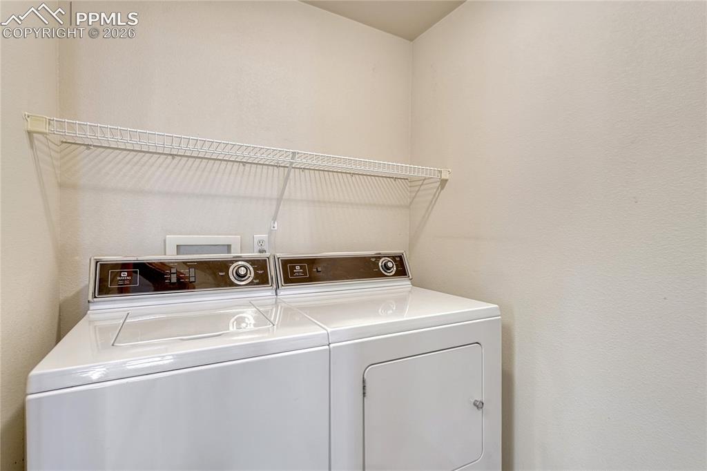 4601 Rowell Point Colorado Springs, CO 80923 - Photo 16 of 48 This main-level laundry room comes with electric hook-ups and provides incredible convenience for single-level living