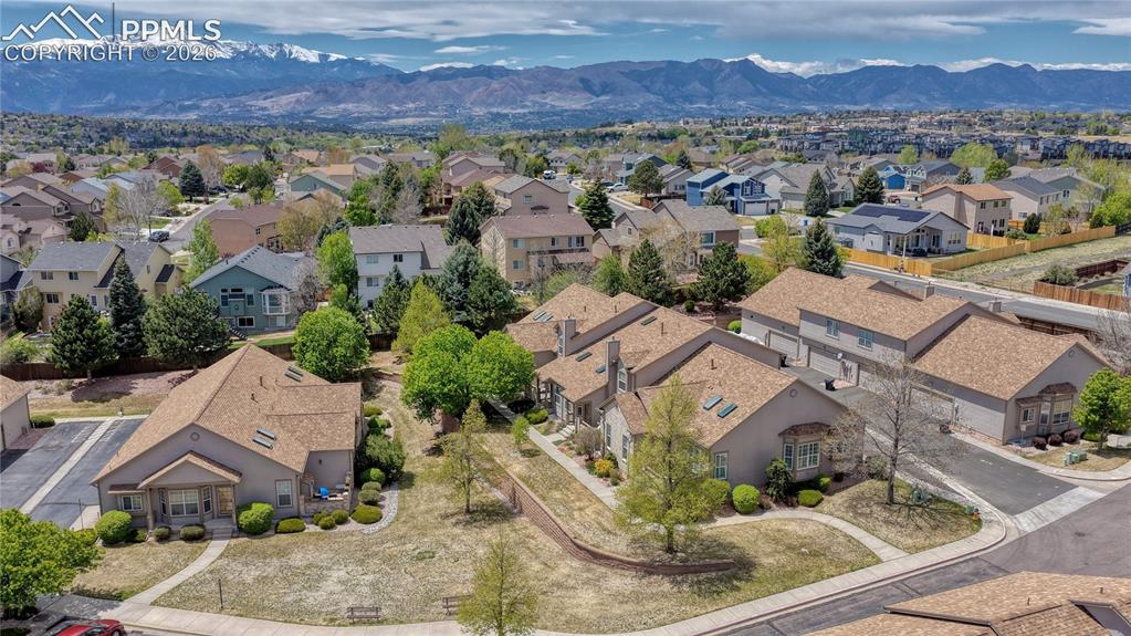 4601 Rowell Point Colorado Springs, CO 80923 - Photo 42 of 48 Aerial views highlight the home's fantastic location in Colorado Springs, with stunning mountain views in the distance
