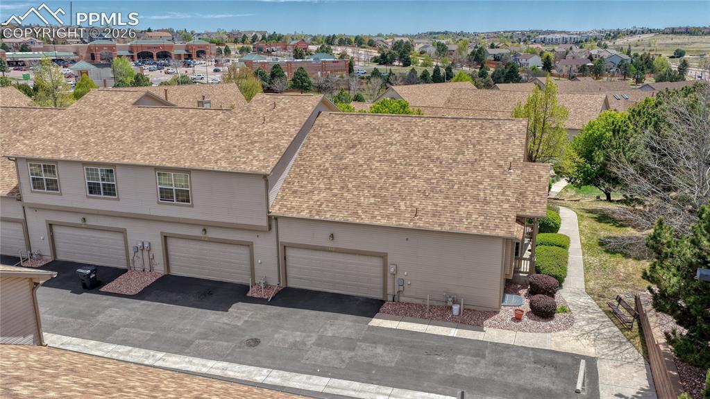 4601 Rowell Point Colorado Springs, CO 80923 - Photo 44 of 48 This drone shot emphasizes the property's convenient access to local shopping, hospitals, parks, and entertainment
