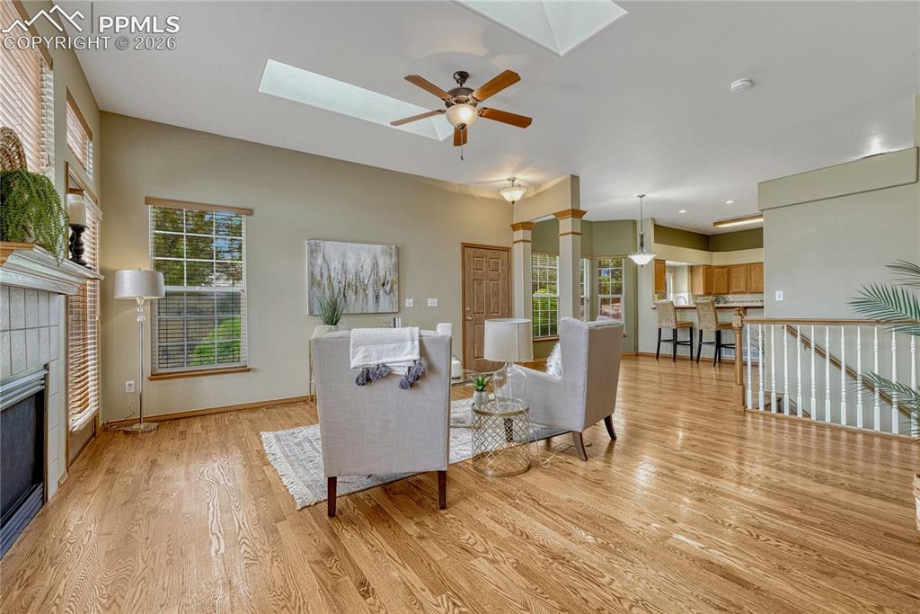 4601 Rowell Point Colorado Springs, CO 80923 - Photo 5 of 48 The open layout offers a seamless transition between the living and dining areas, ideal for entertaining.