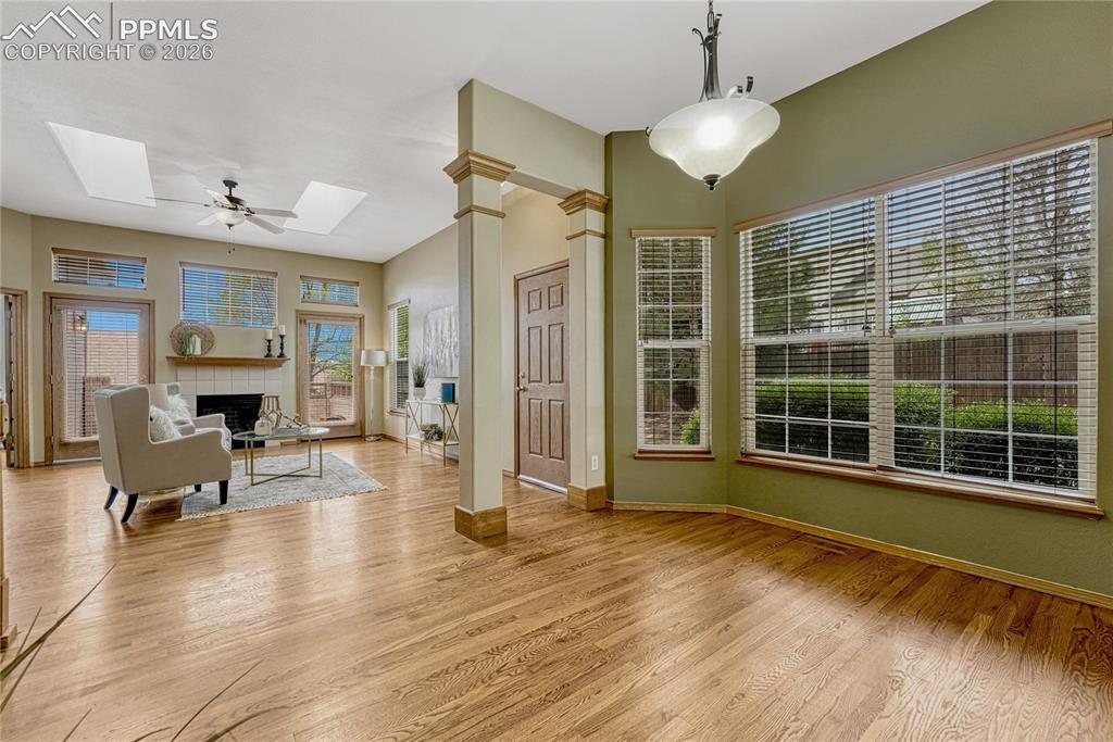 4601 Rowell Point Colorado Springs, CO 80923 - Photo 8 of 48 The open dining and living space provides plenty of room for hosting friends and family, enhanced by 9-foot ceilings