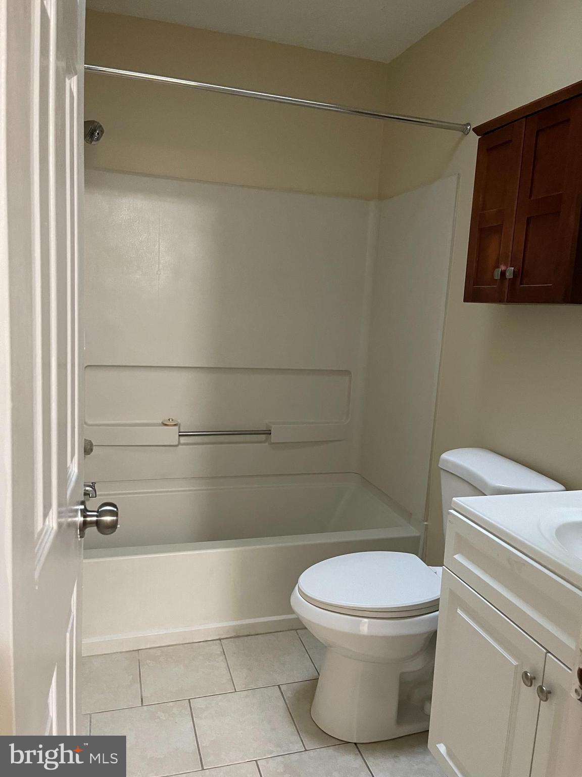 2420 Rosecroft Court Oxon Hill, MD 20745 - Photo 13 of 29 a bathroom with a toilet and a shower