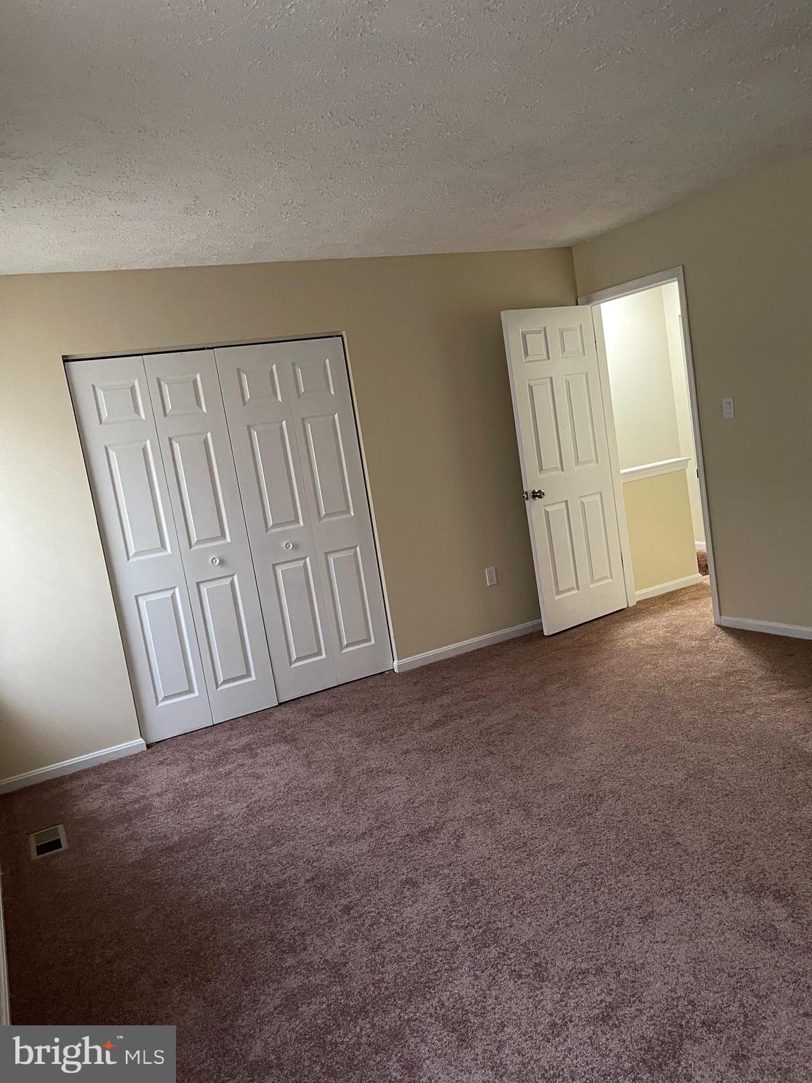 2420 Rosecroft Court Oxon Hill, MD 20745 - Photo 14 of 29 a view of an empty room with a window