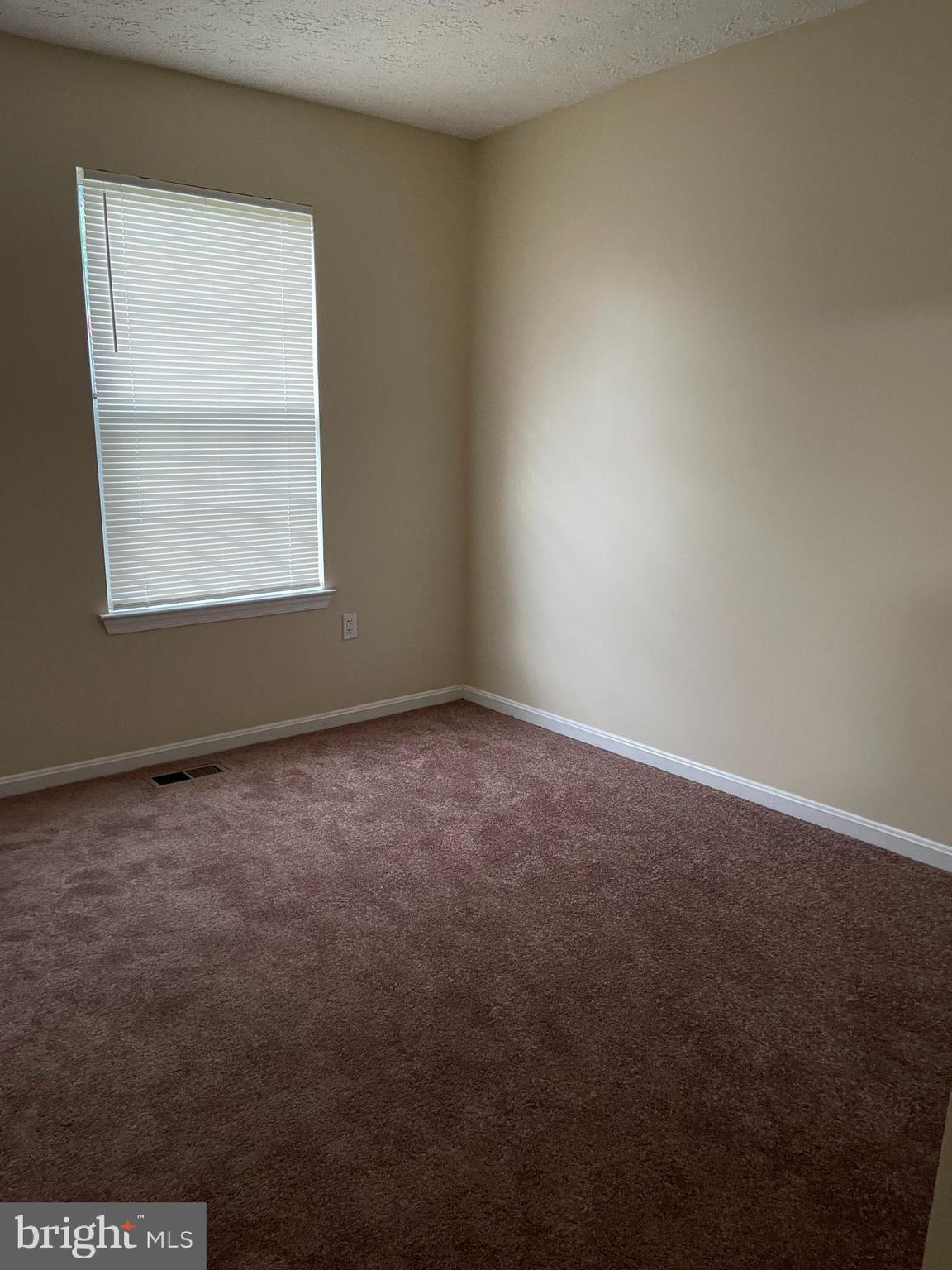 2420 Rosecroft Court Oxon Hill, MD 20745 - Photo 18 of 29 an empty room with a window