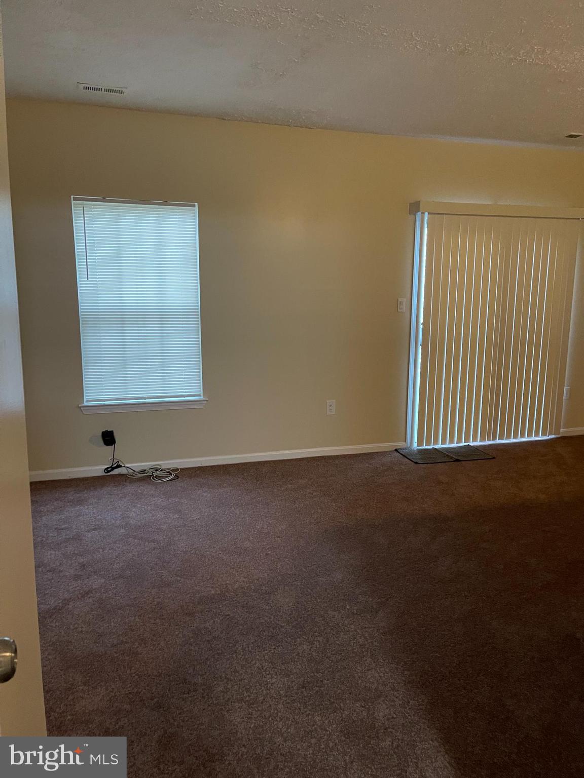2420 Rosecroft Court Oxon Hill, MD 20745 - Photo 8 of 29 an empty room with a window