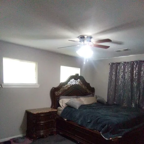 a bathroom with a sink toilet and mirror