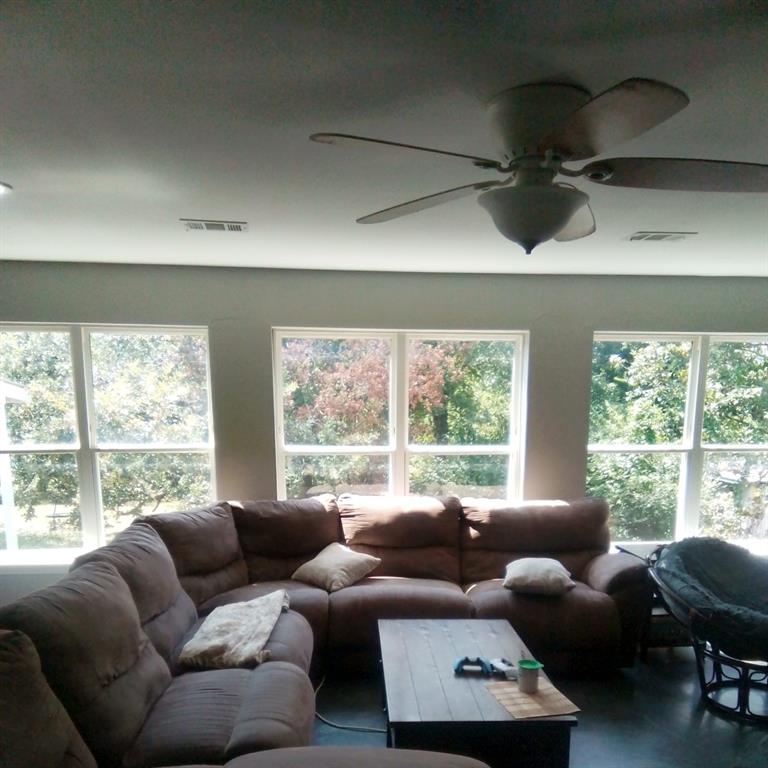 5786 Rockhill Road Fort Worth, TX 76112 - Photo 26 of 26 a living room with furniture and a large window
