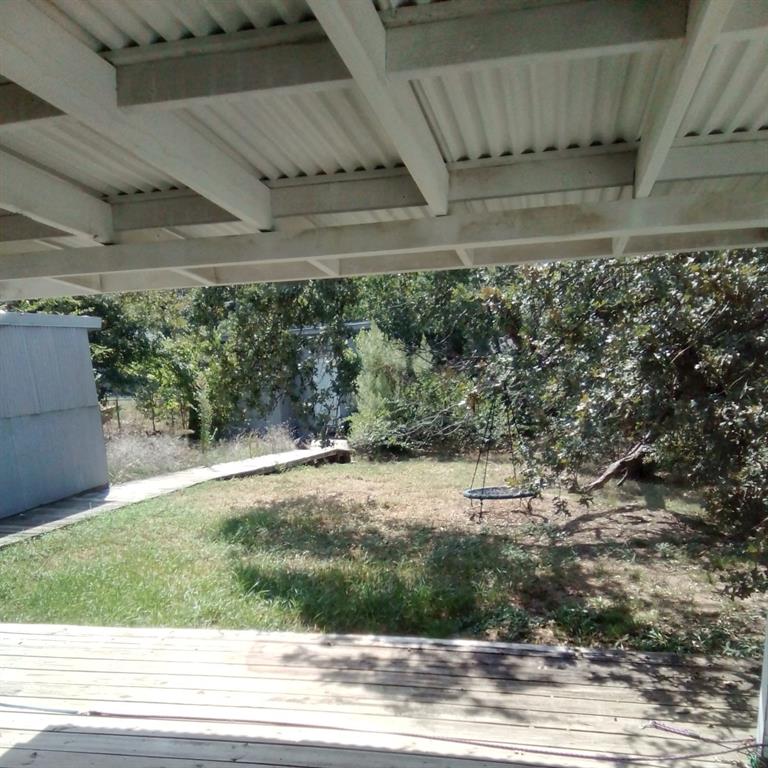 5786 Rockhill Road Fort Worth, TX 76112 - Photo 7 of 26 a view of a yard