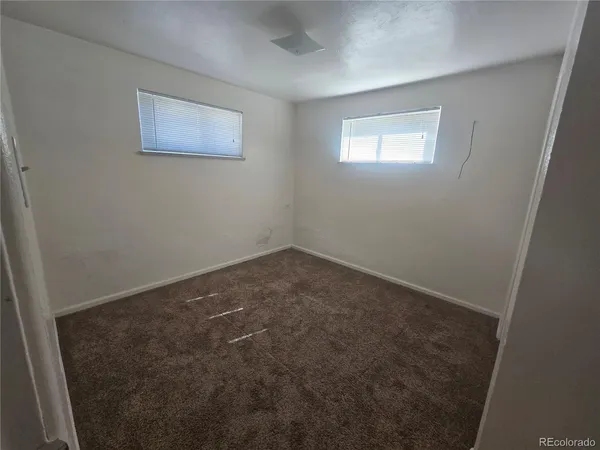 a bathroom with a toilet a sink and bathtub