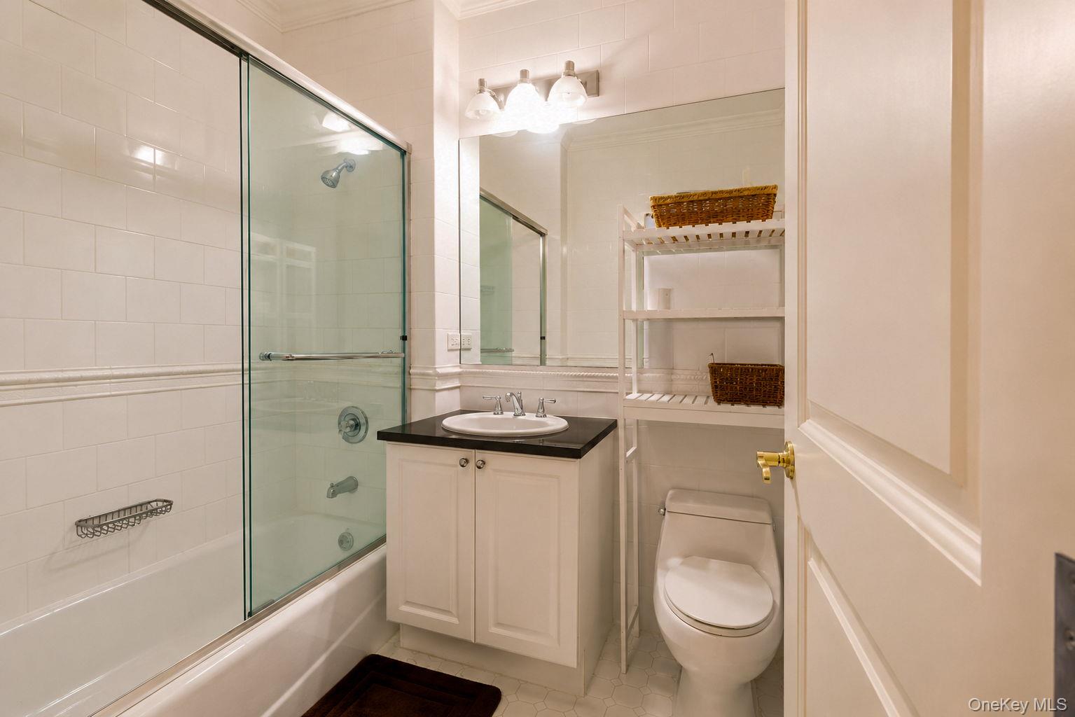 1 Scarsdale Road, Unit 409 Tuckahoe, NY 10707 - Photo 24 of 42 Bathroom with tub and shower