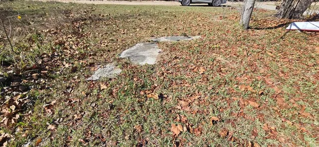 a view of residential space with parking space