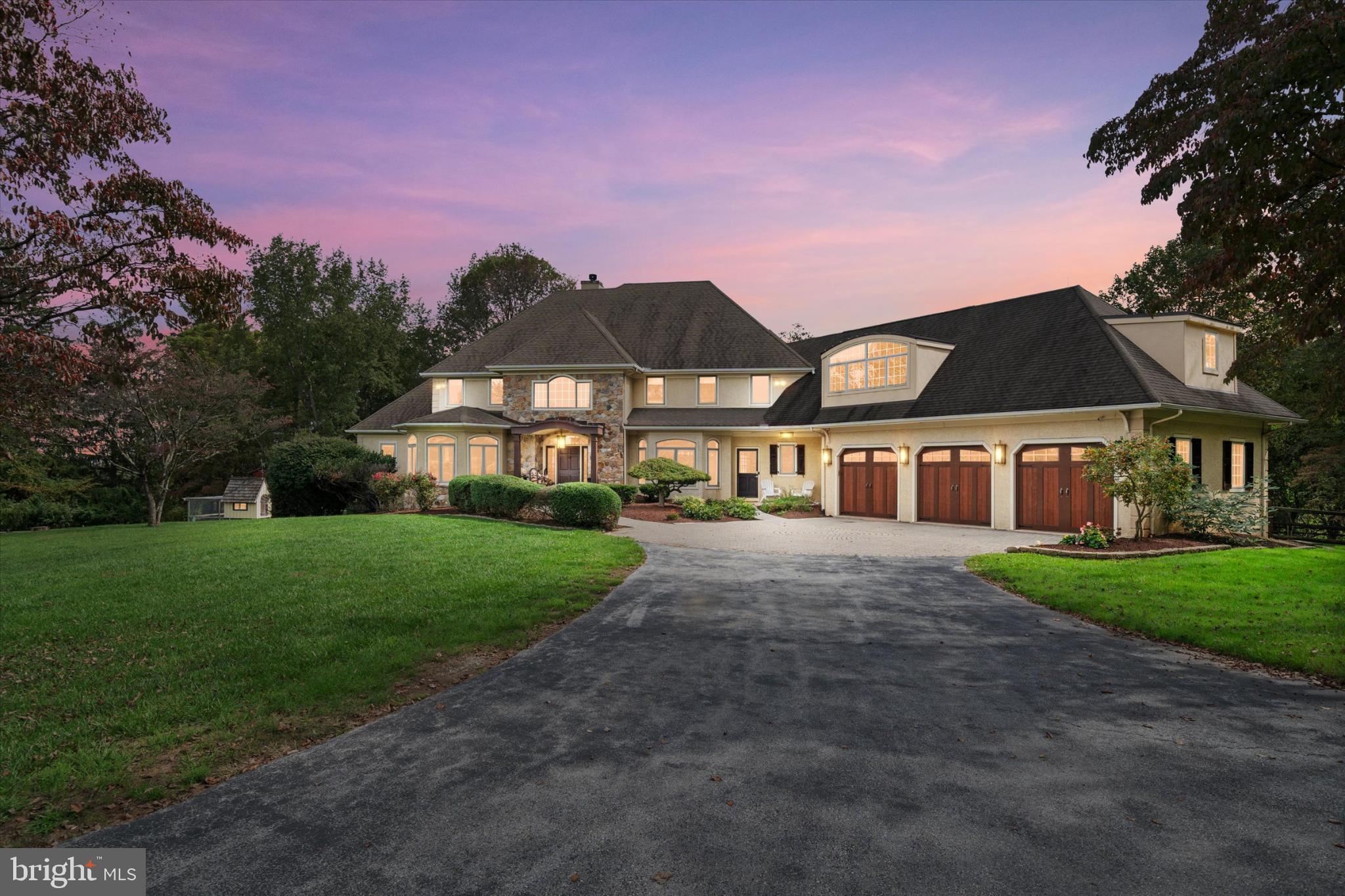 1540 Fairville Road Chadds Ford, PA 19317 - Photo 2 of 86 a front view of a house with a yard and garage