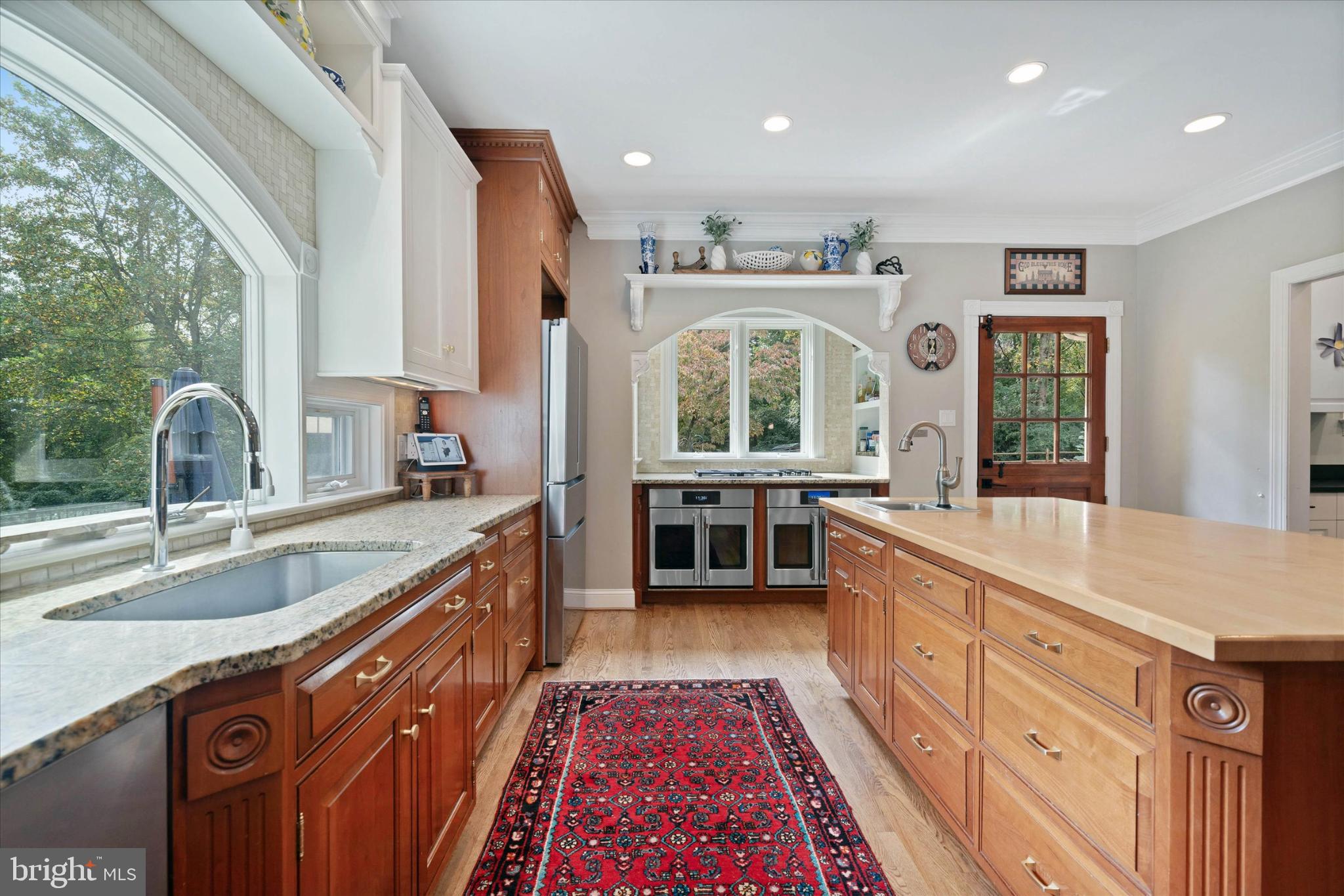 1540 Fairville Road Chadds Ford, PA 19317 - Photo 25 of 86 a large kitchen with kitchen island granite countertop a large window