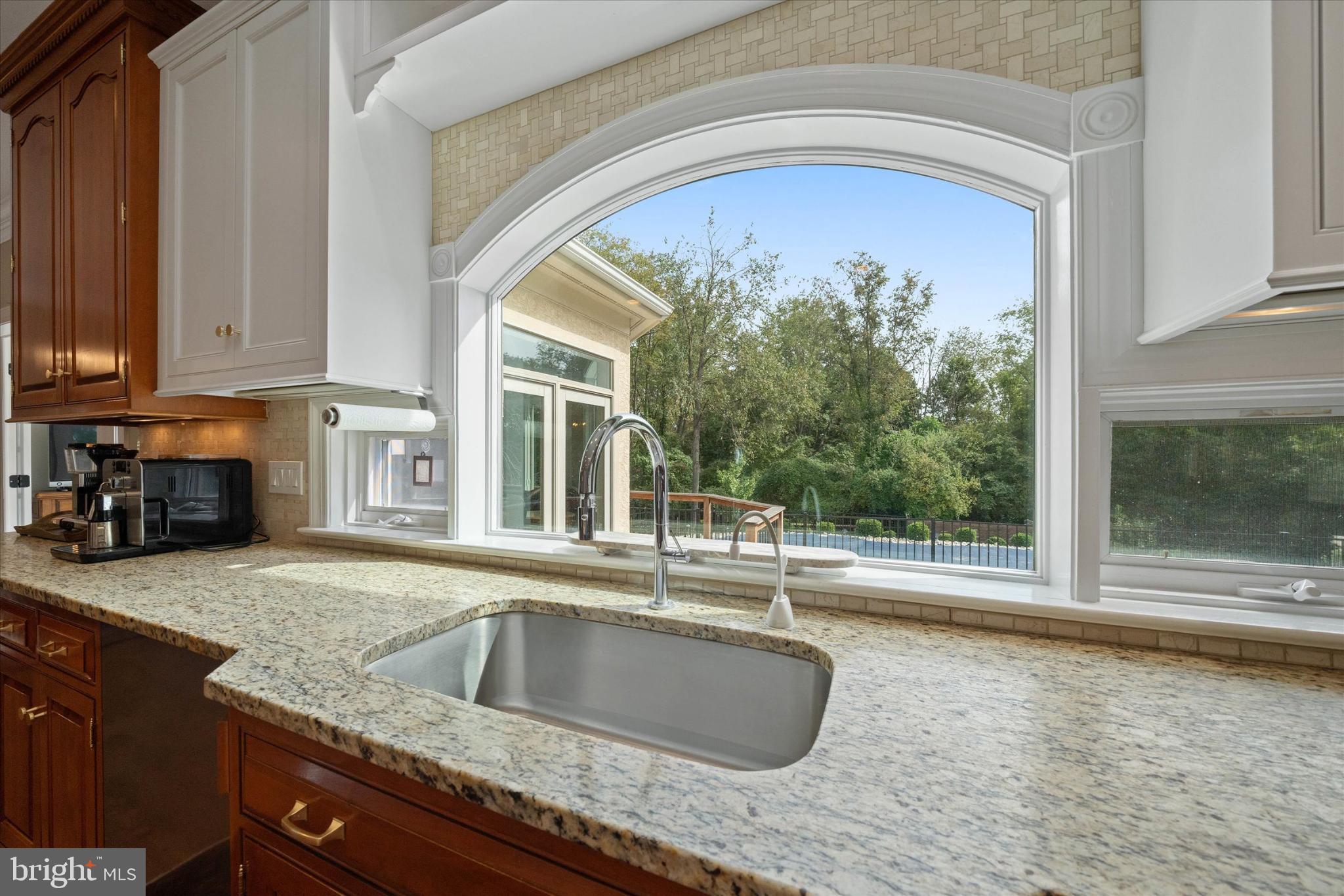 1540 Fairville Road Chadds Ford, PA 19317 - Photo 28 of 86 Sunny kitchen with scenic outdoor view.