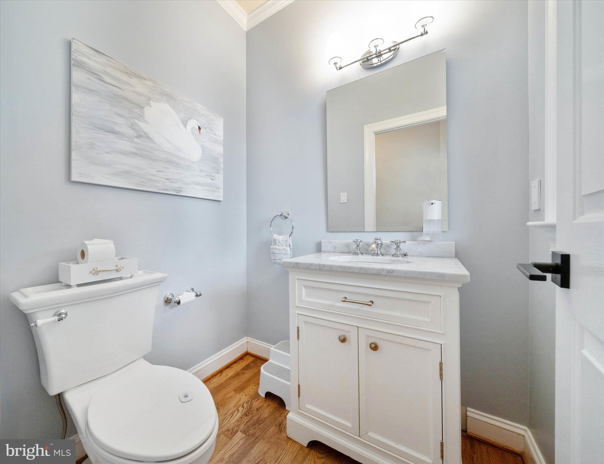 1540 Fairville Road Chadds Ford, PA 19317 - Photo 31 of 86 a bathroom with a toilet a sink and mirror