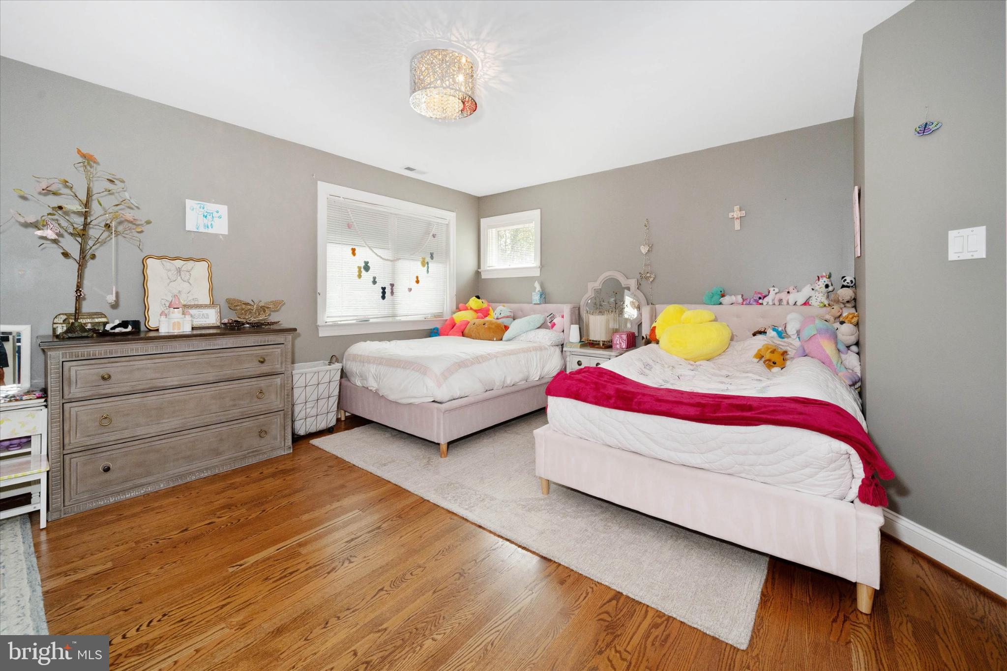 1540 Fairville Road Chadds Ford, PA 19317 - Photo 44 of 86 a bedroom with two beds and painting on the wall