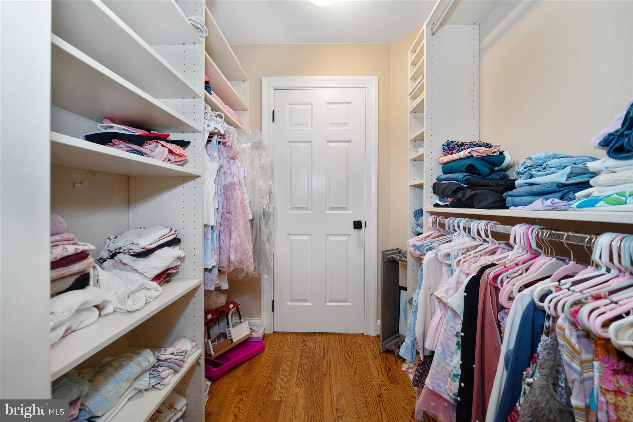 1540 Fairville Road Chadds Ford, PA 19317 - Photo 47 of 86 a view of walk in closet with clothes and shoes