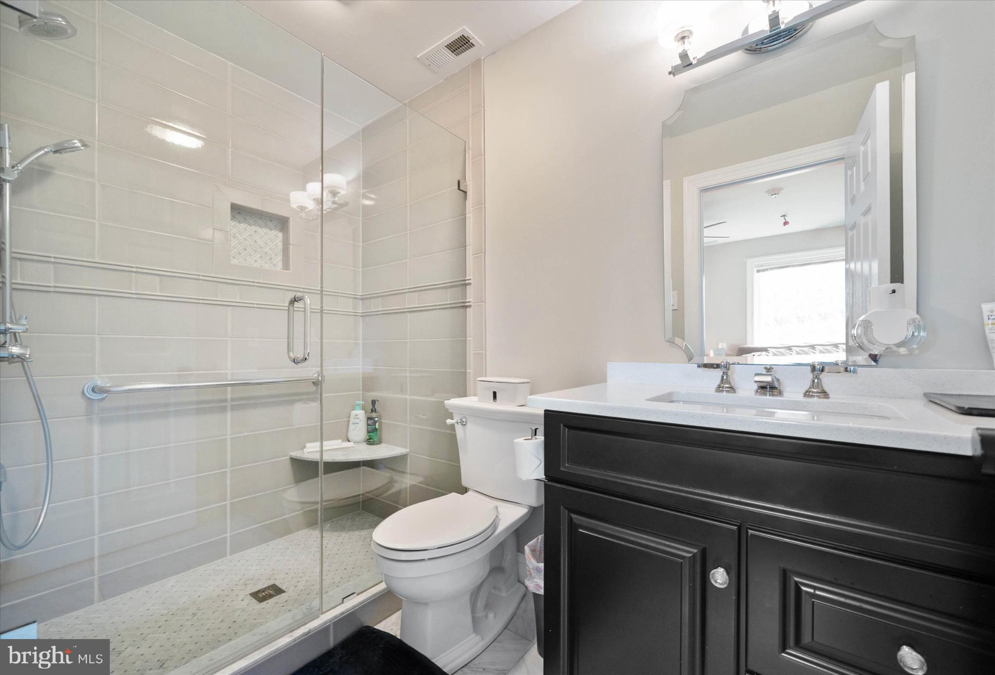 1540 Fairville Road Chadds Ford, PA 19317 - Photo 51 of 86 Sleek modern bathroom with elegant finishes.