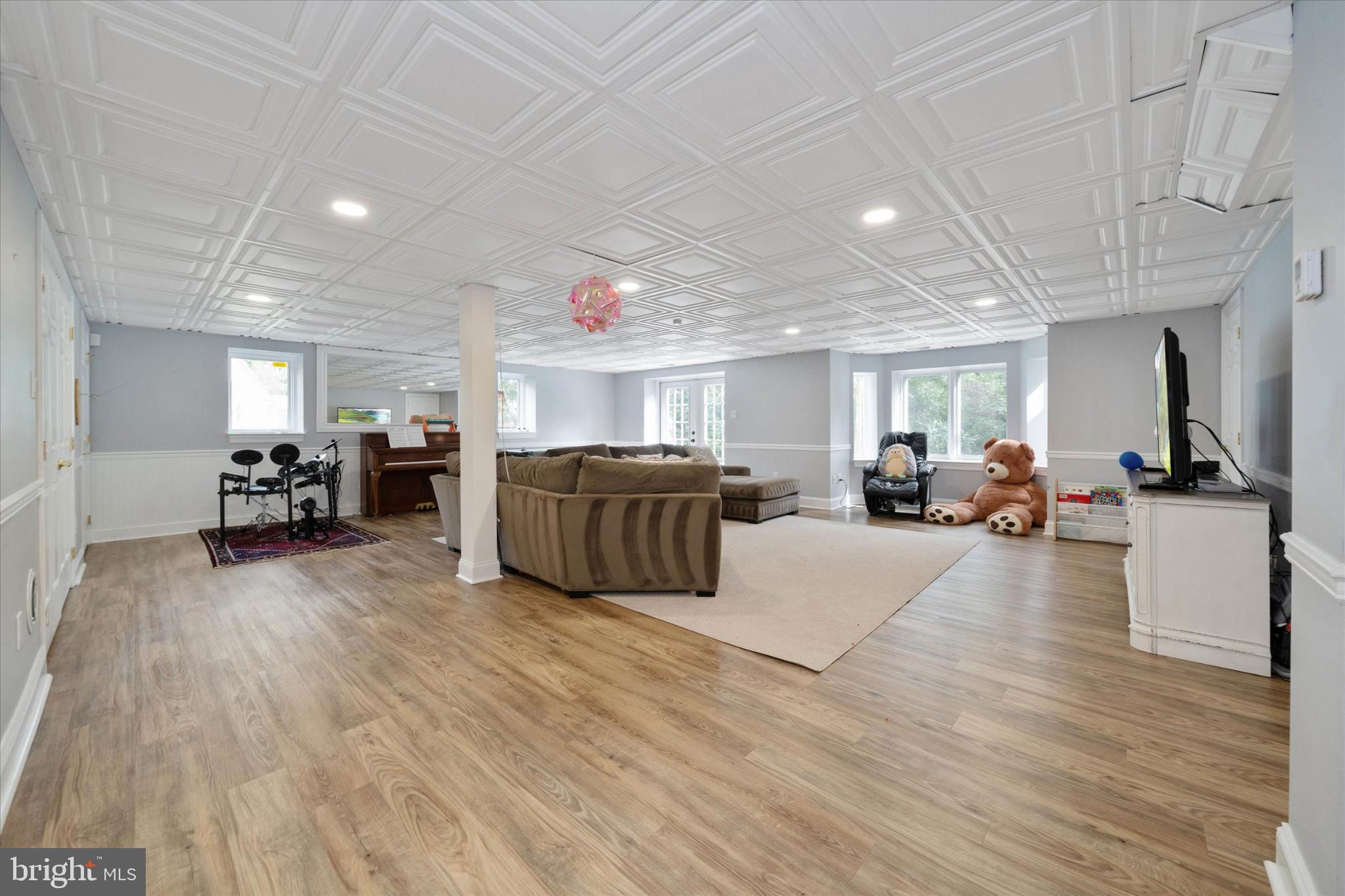 1540 Fairville Road Chadds Ford, PA 19317 - Photo 60 of 86 a living room with furniture and a flat screen tv