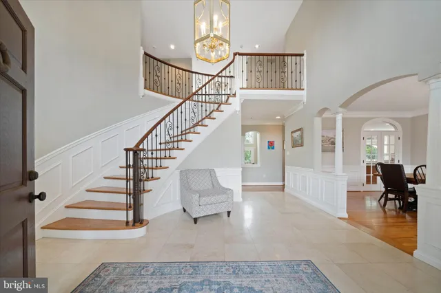 a view of livingroom and dining room with wooden floor