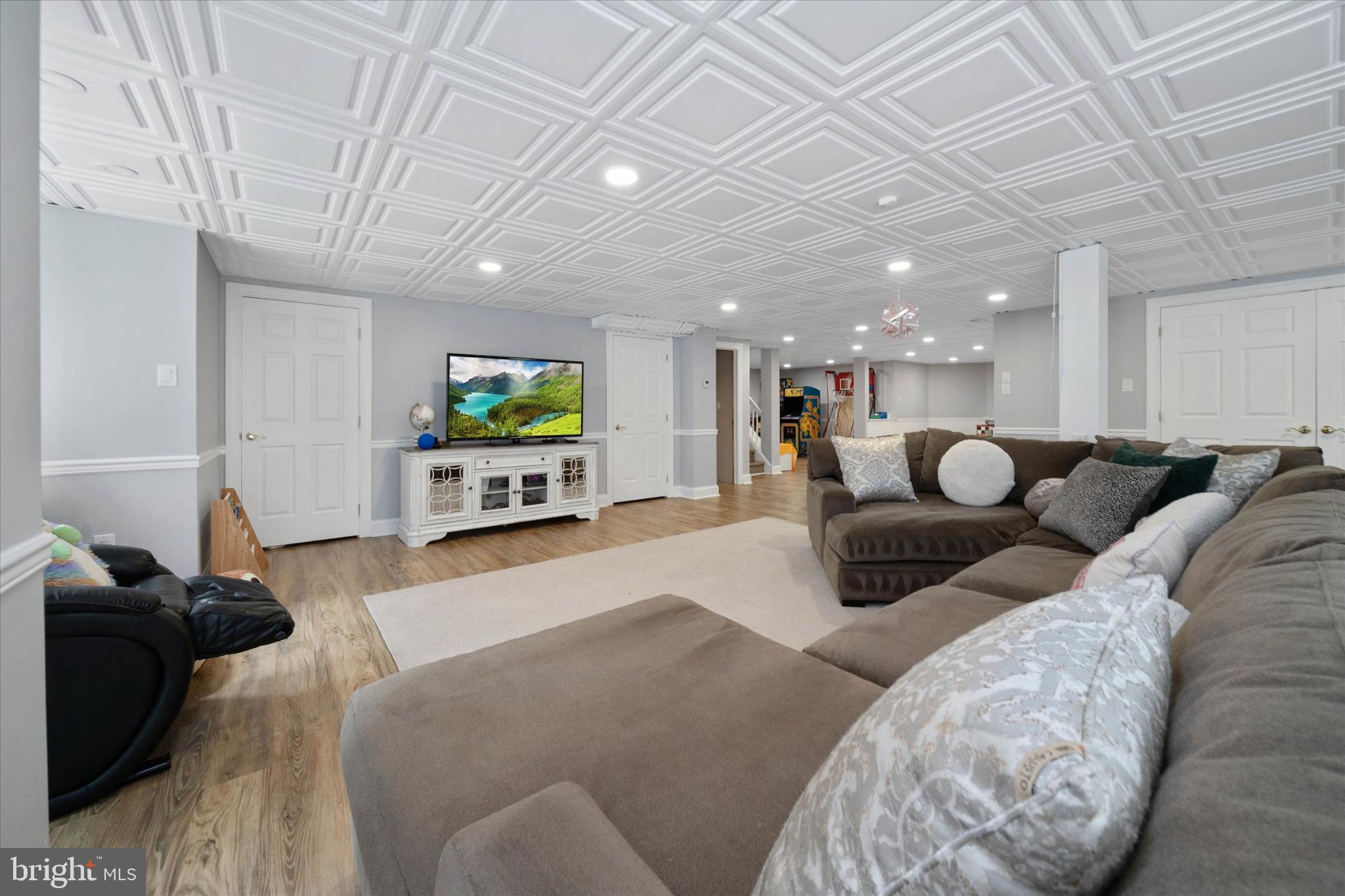 1540 Fairville Road Chadds Ford, PA 19317 - Photo 61 of 86 a living room with furniture and a flat screen tv